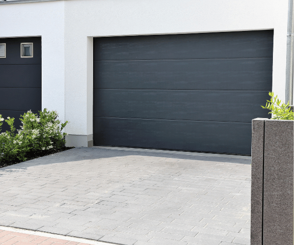 Garage door repair technicians replacing a broken spring in South San Francisco