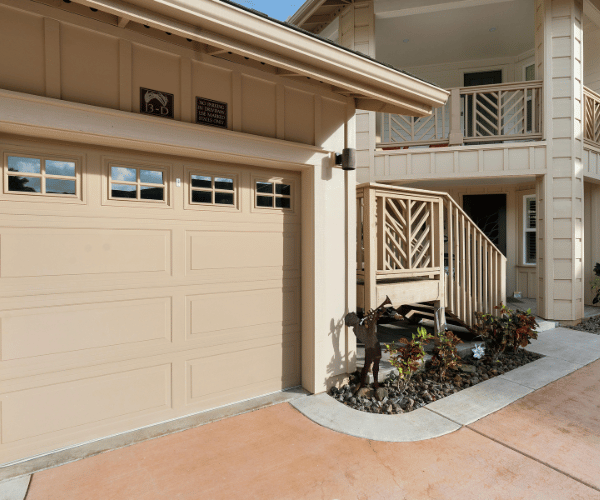 Garage door repair technicians replacing a broken spring in Burlingame