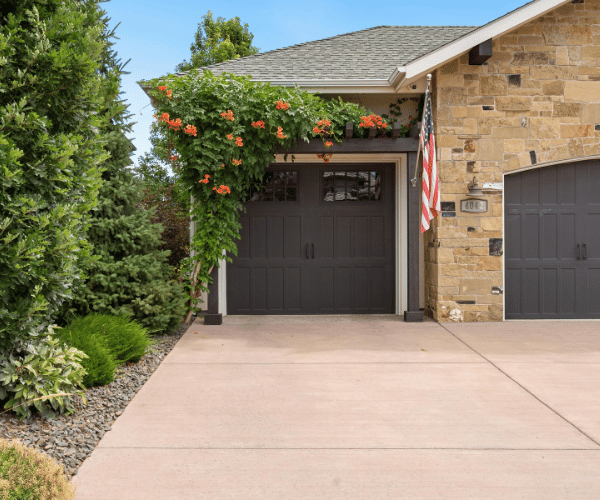 Garage door repair technicians replacing a broken spring in San Rafael