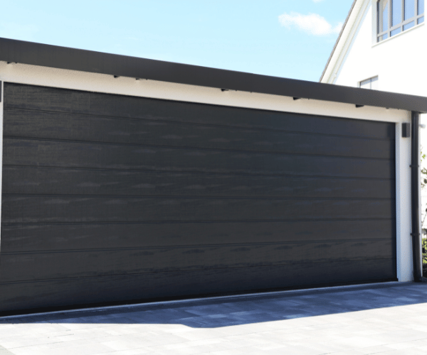 Garage door repair technicians replacing a broken spring in South San Francisco