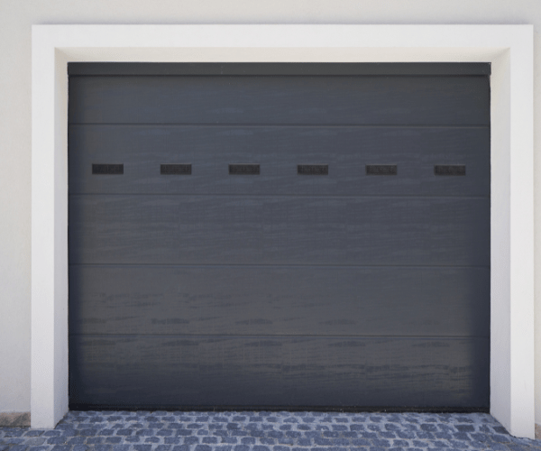 Garage door repair technicians replacing a broken spring in Sausalito