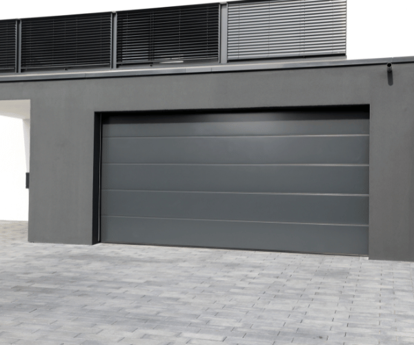 Garage door repair technicians replacing a broken spring in Mill Valley