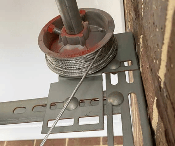 garage door cable off drum repair